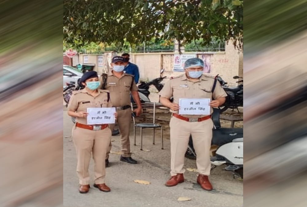 Lockdown in uttarakhand: haridwar police support Punjab Police Officer Harjeet Singh with posters