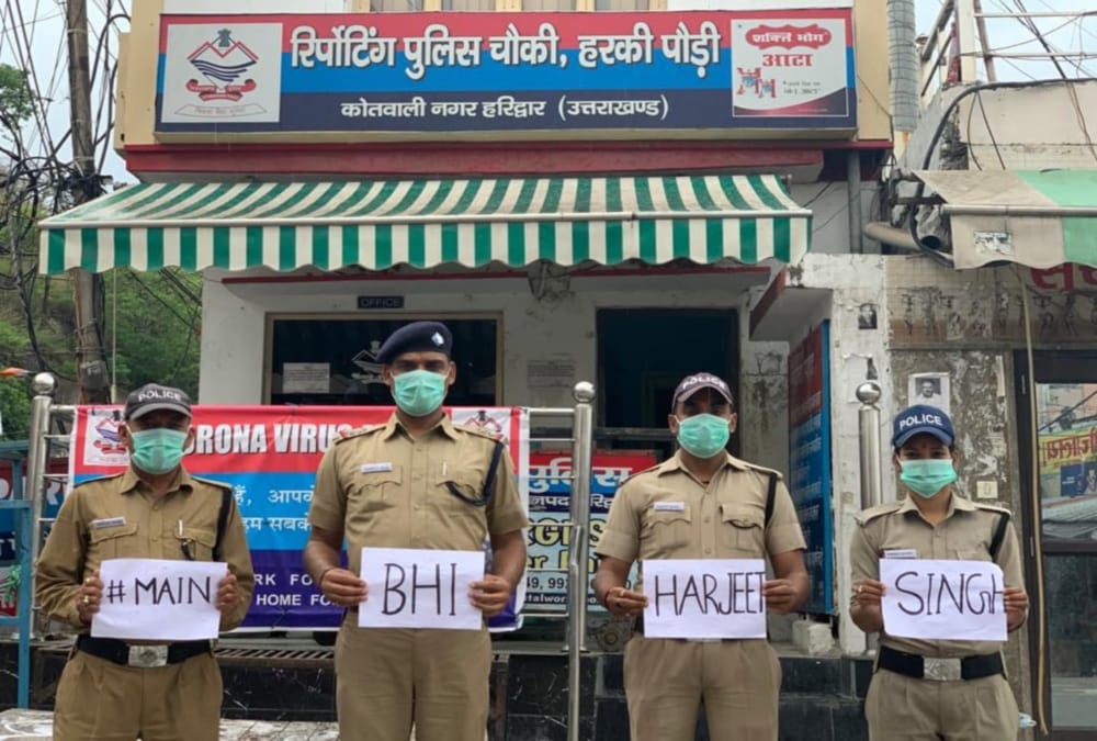 Lockdown in uttarakhand: haridwar police support Punjab Police Officer Harjeet Singh with posters