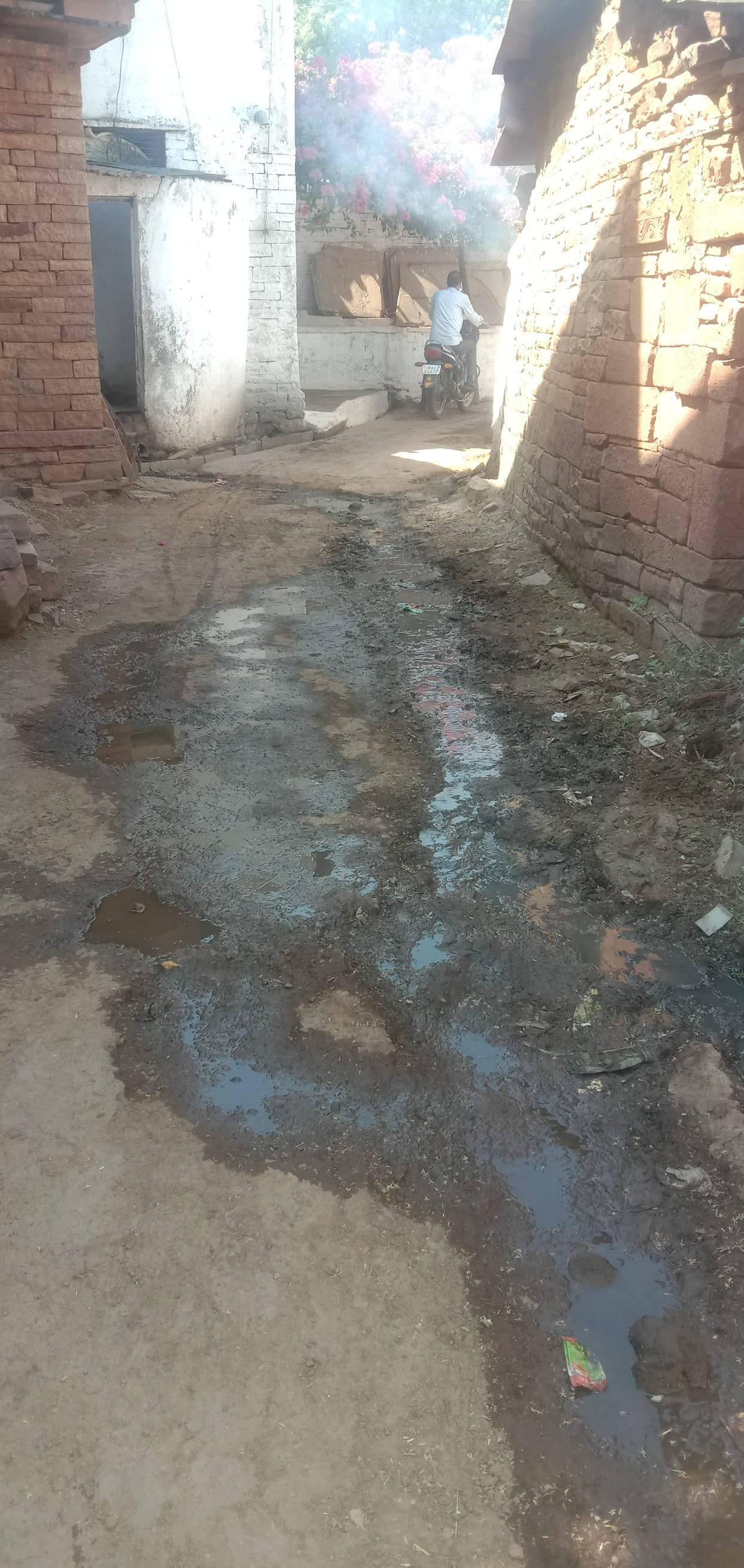 Dirty water full in road, village sainitize