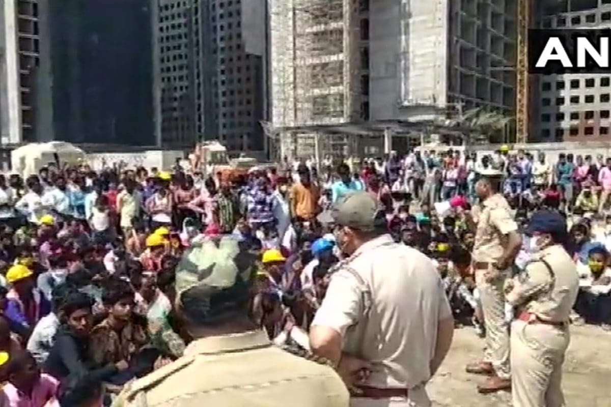 gujarat labourers protest pelted stones at office of Diamond Bourse demand to sent back to their native places