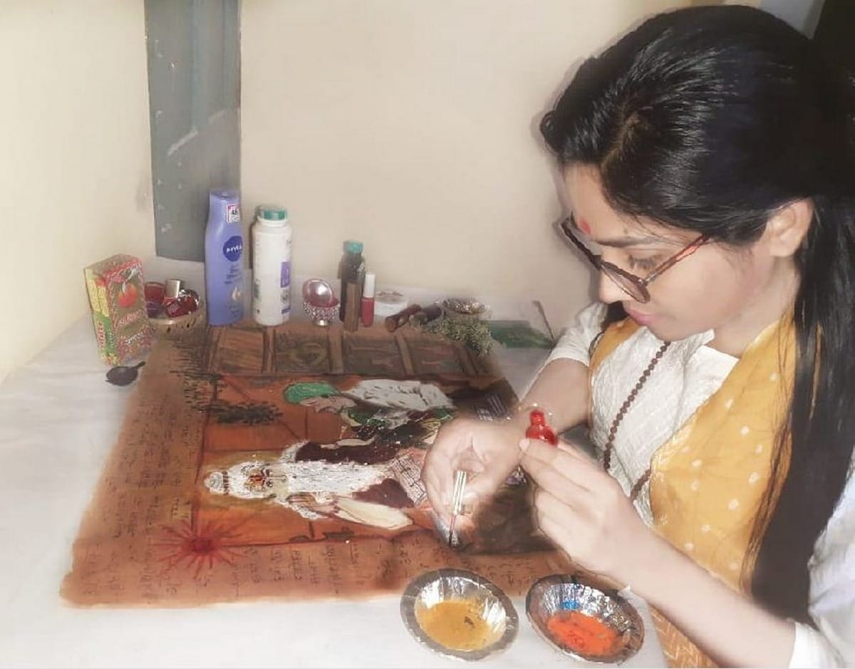 BHU Vedic Science Center girl student make painting makeup accessories and spices of Sage modern scientist