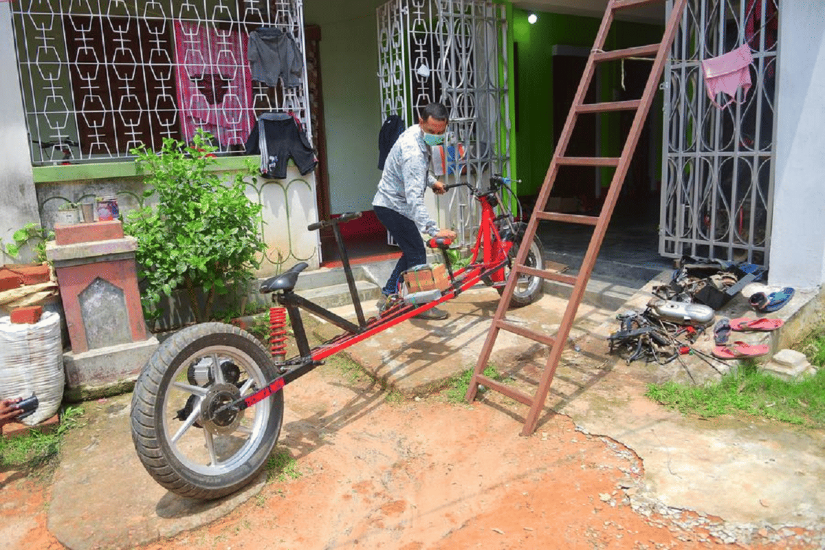 tripura agartala partha saha motorbike social distancing coronavirus electric motor bike innovation and creativity tripura cm