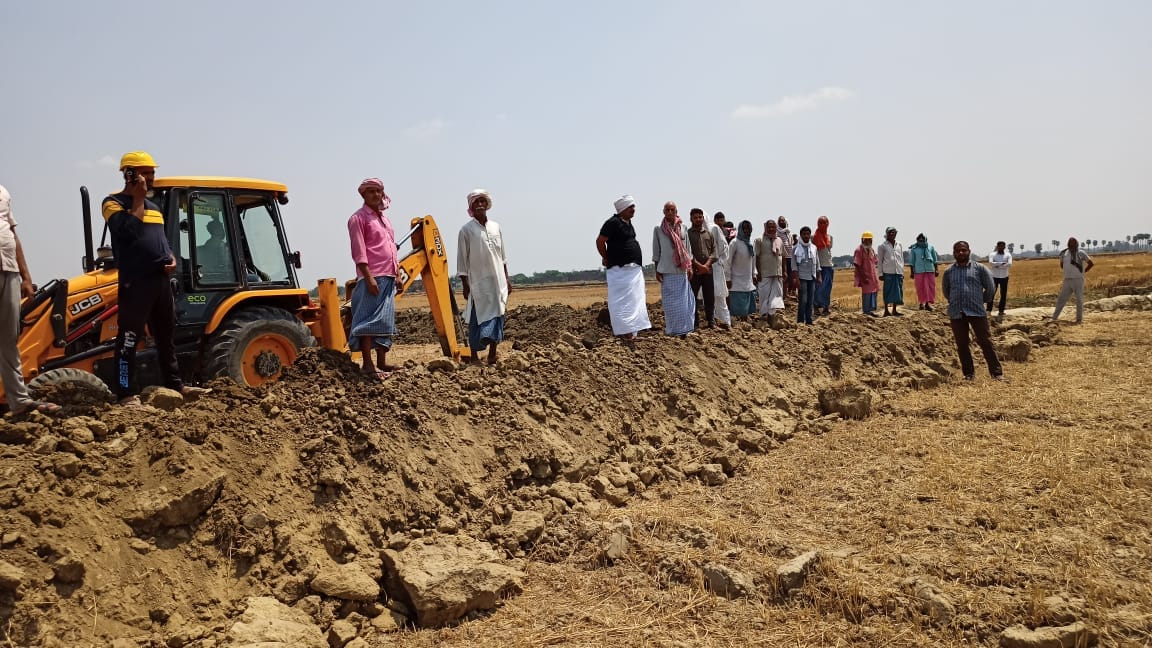 If Gram pradhan refused, the villagers engaged in building the check road itself, being built 500 meters from the JCB