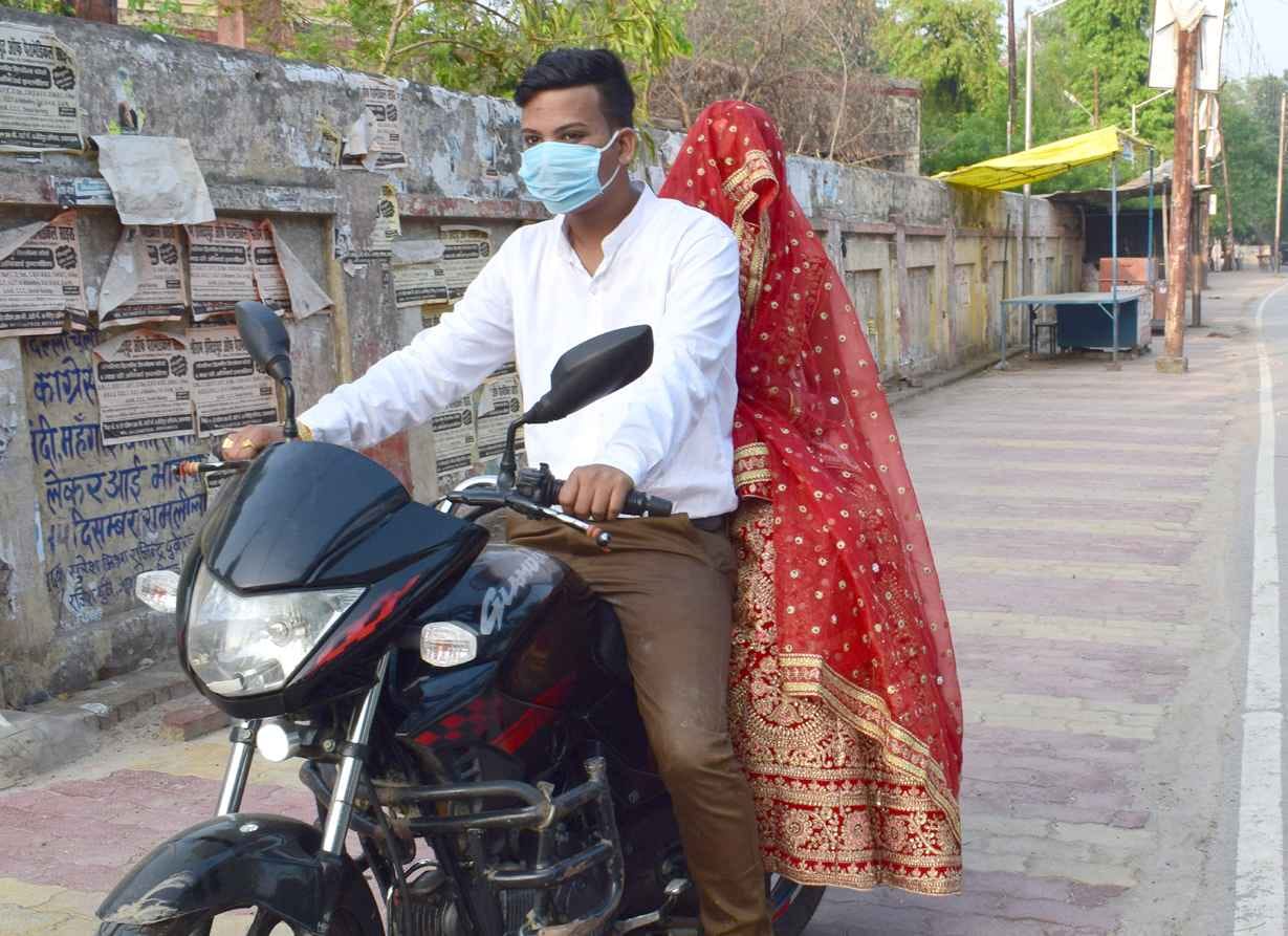 The groom took the bride by bike