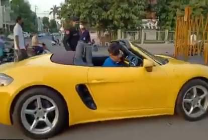 Porsche rider made to do sit ups for not wearing mask 