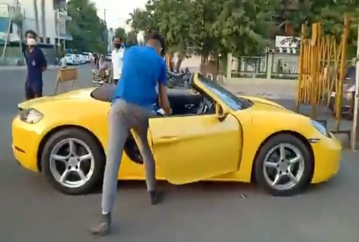Porsche rider made to do sit ups for not wearing mask 