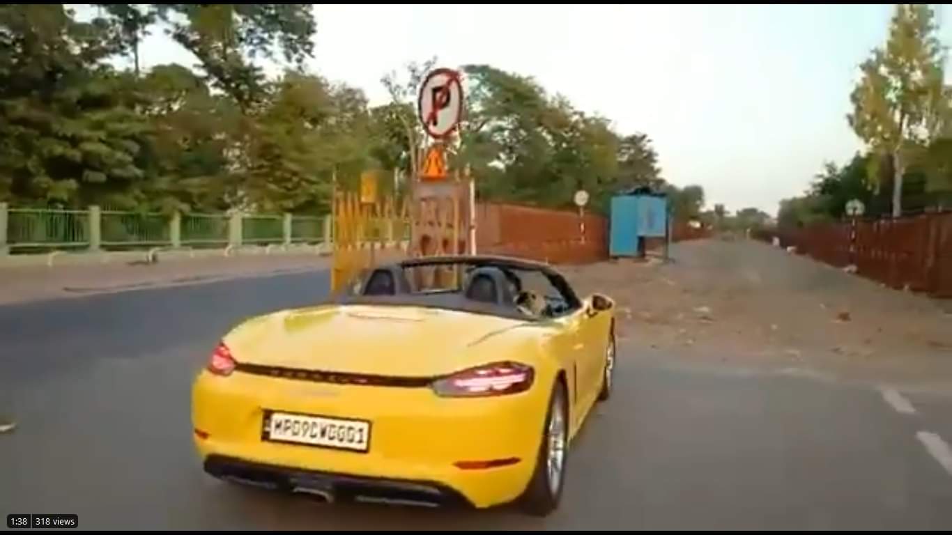 Porsche rider made to do sit ups for not wearing mask 