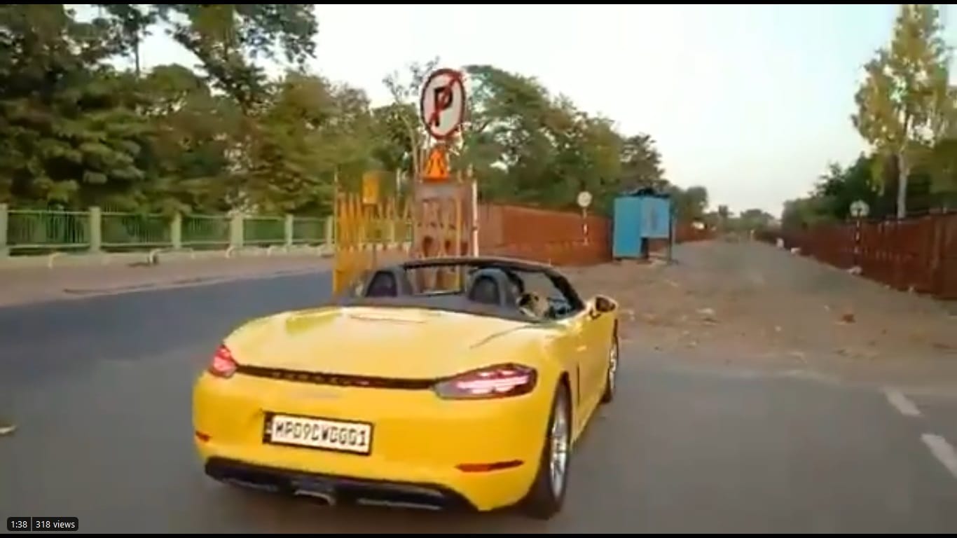 Porsche rider made to do sit ups for not wearing mask 