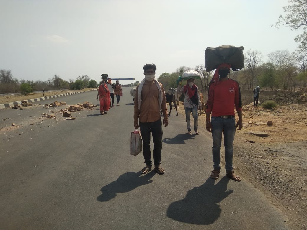 workers gathered at wokers grave rded