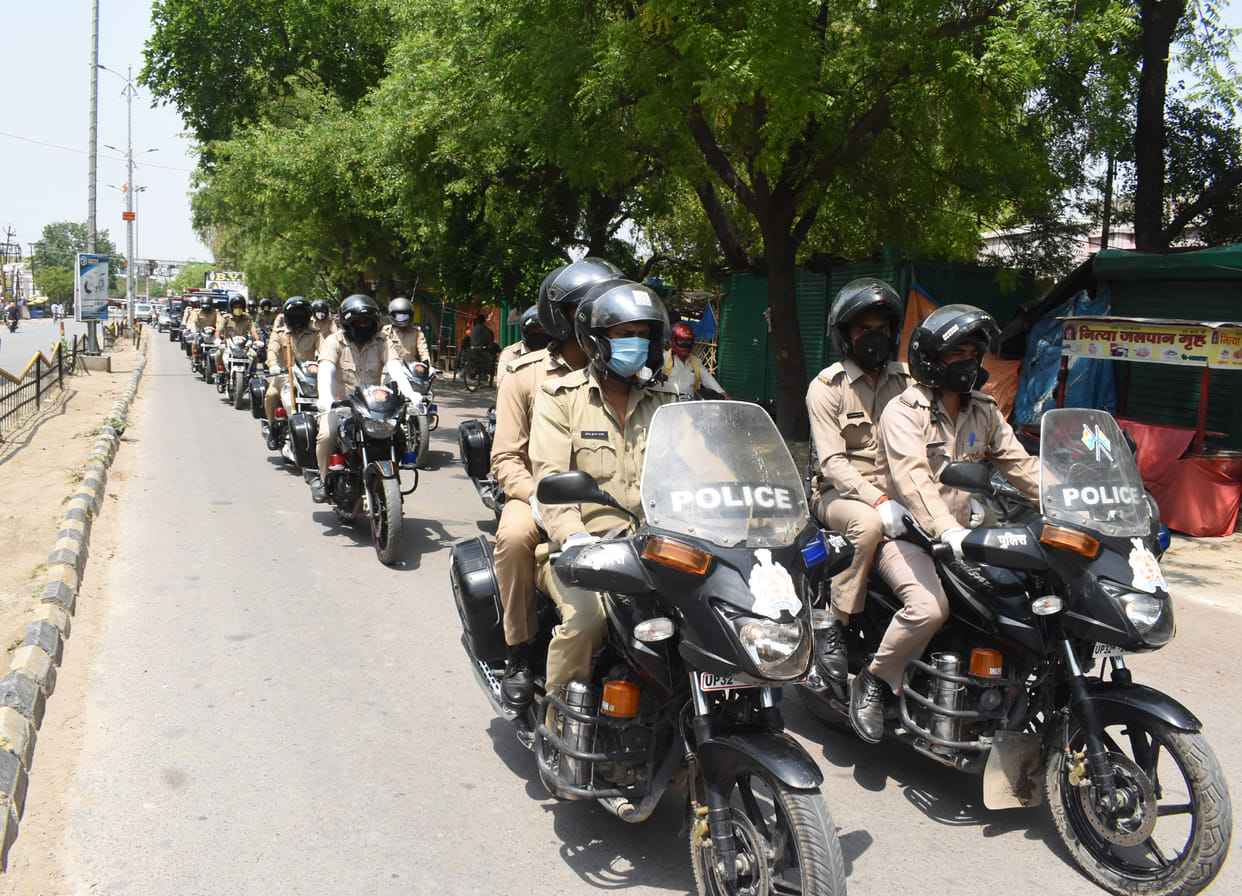 Compliance of lockdown by flag march