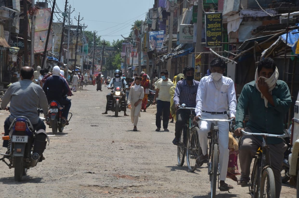 Crowds gathered in the markets, social distancing in front of banks
