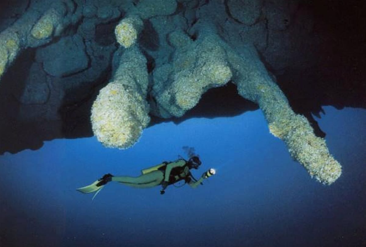 Mystery of Great Blue Hole giant marine sinkhole off the coast of Belize