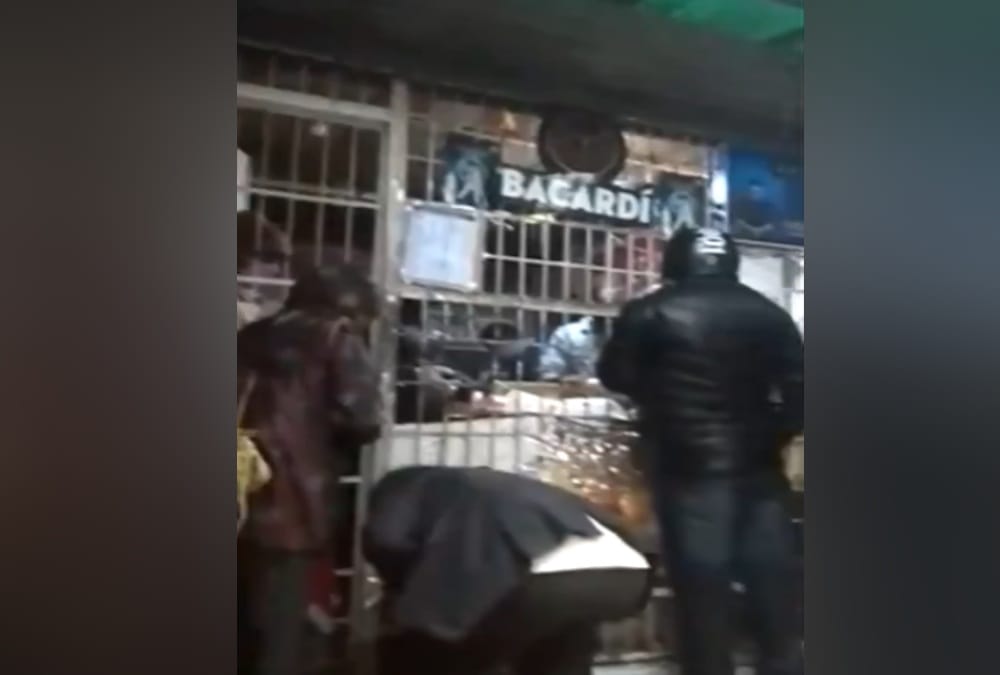 Lockdown 3.0 Wine Shop Open in Uttarakhand: people stand during hailstorm to buy liquor on Mall Road in Nainital