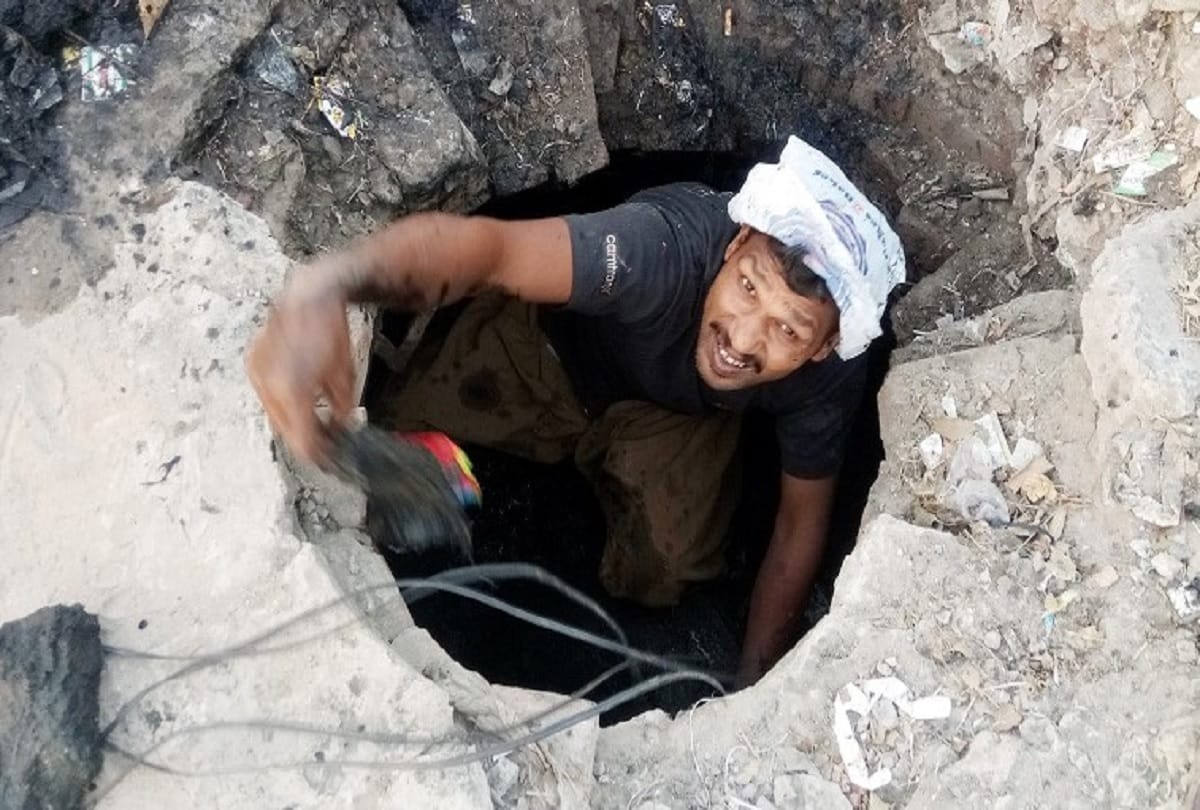 gujarat ahmedabad two sanitation workers died of suffocation while cleaning sewage