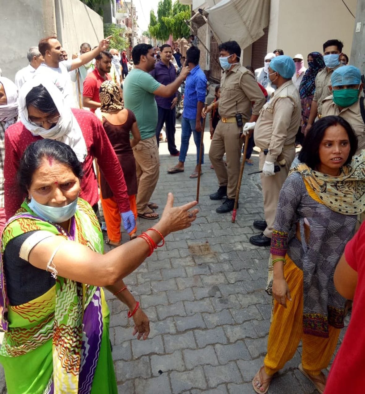 police beaten to women, clothes torn