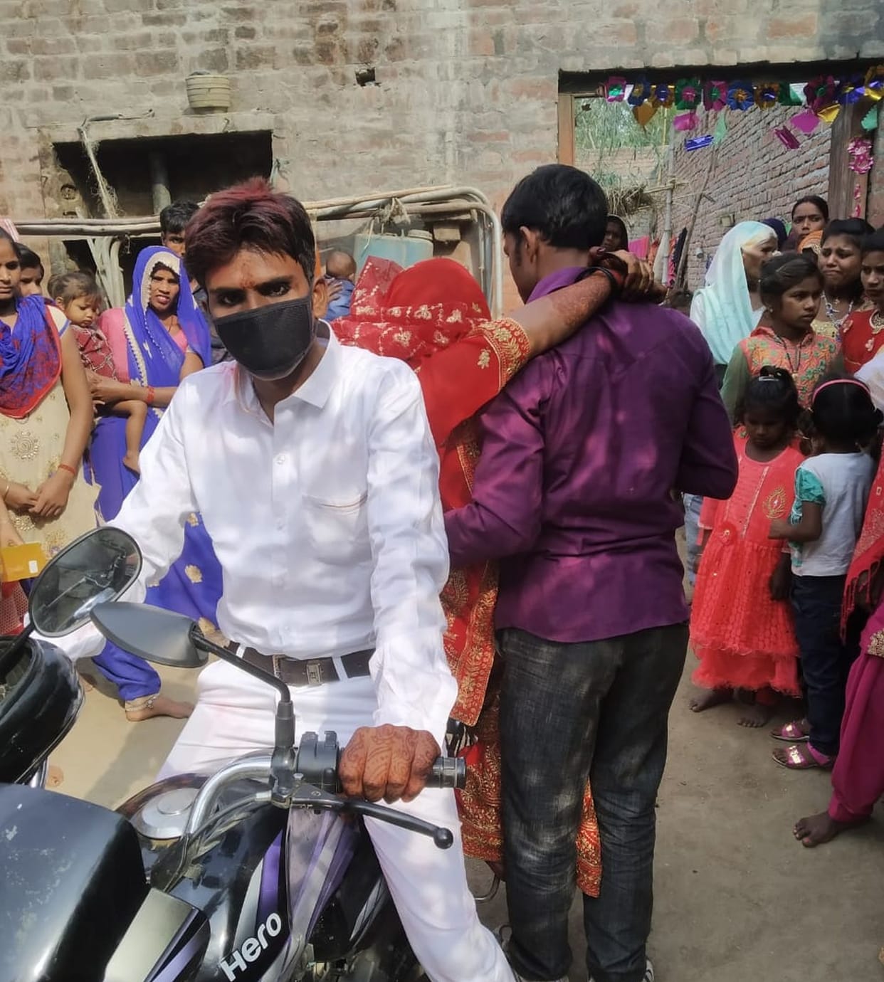 After the wedding, the bride departs from the bike