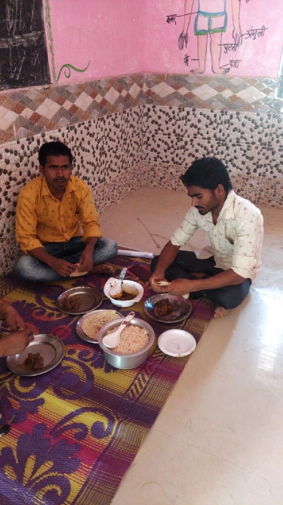 Workers flew chicken and biryani feast at Quarantine Center