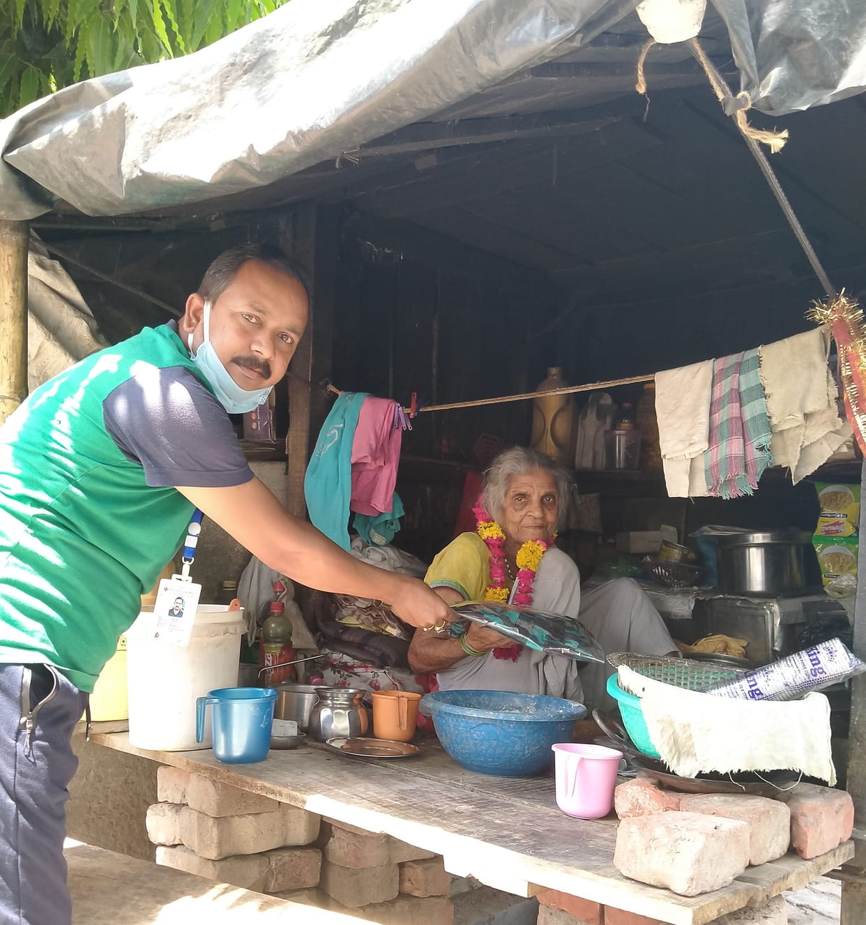 Amma honored to feed the poor on Mother's Day