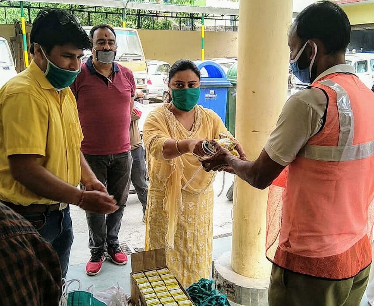 Distribute masks to cleaning staff