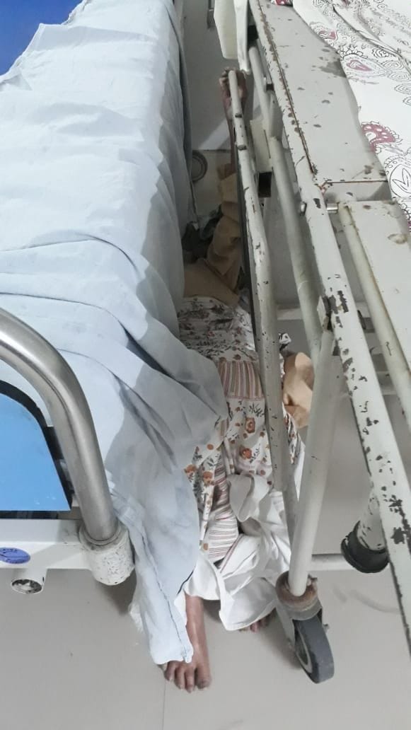 old lady fell on the ground in isolation ward