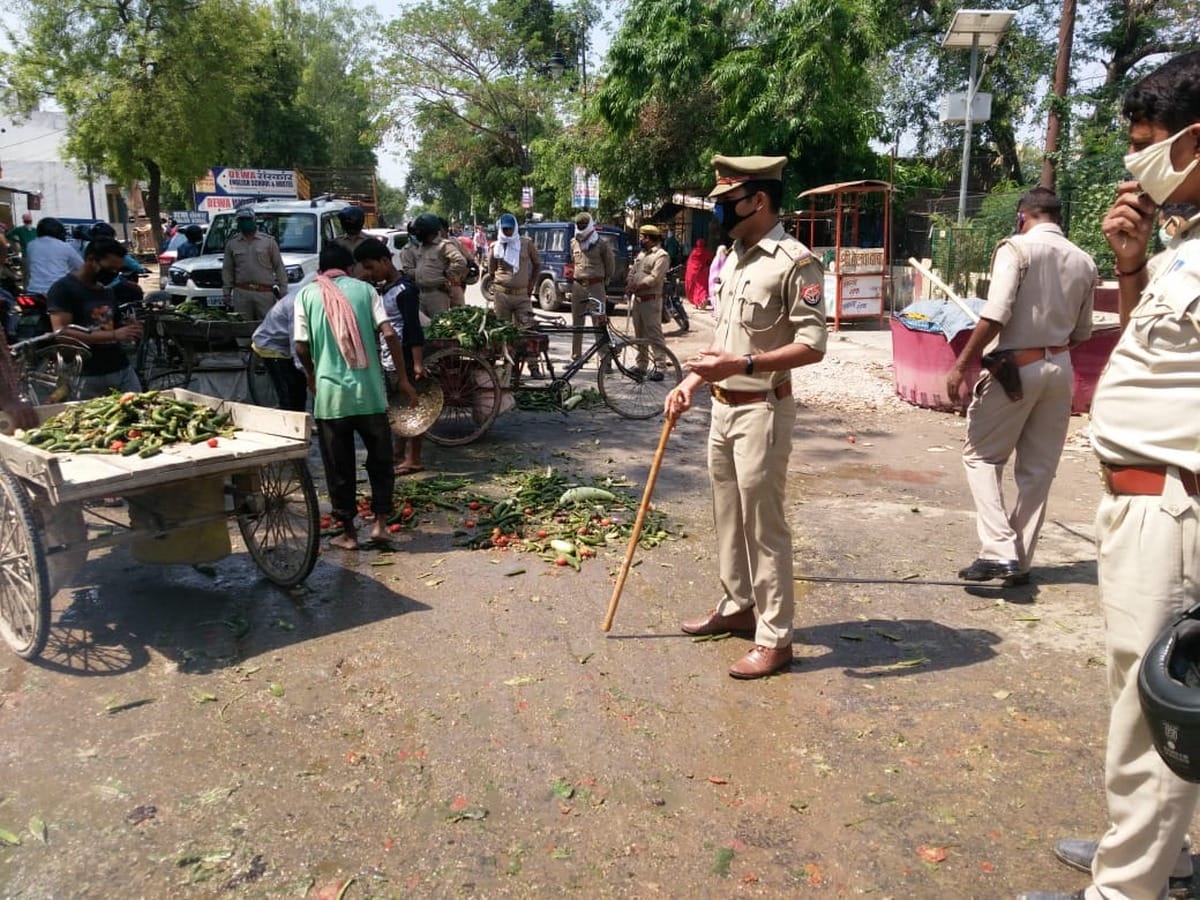 Farmers upset with new rules protest vegetables throwing on in varanasi