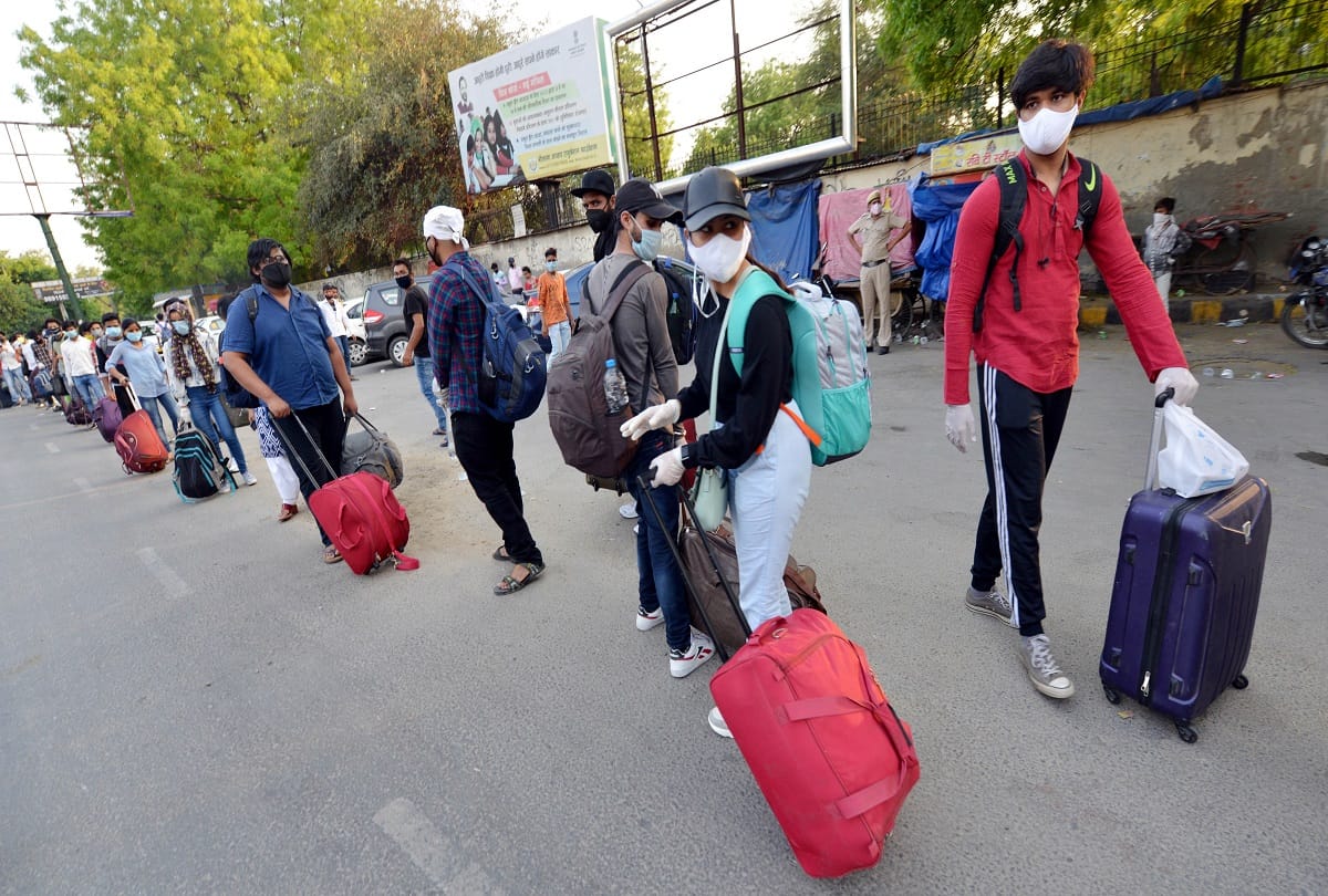 railways service resume new delhi railway station huge crowd long queue passengers