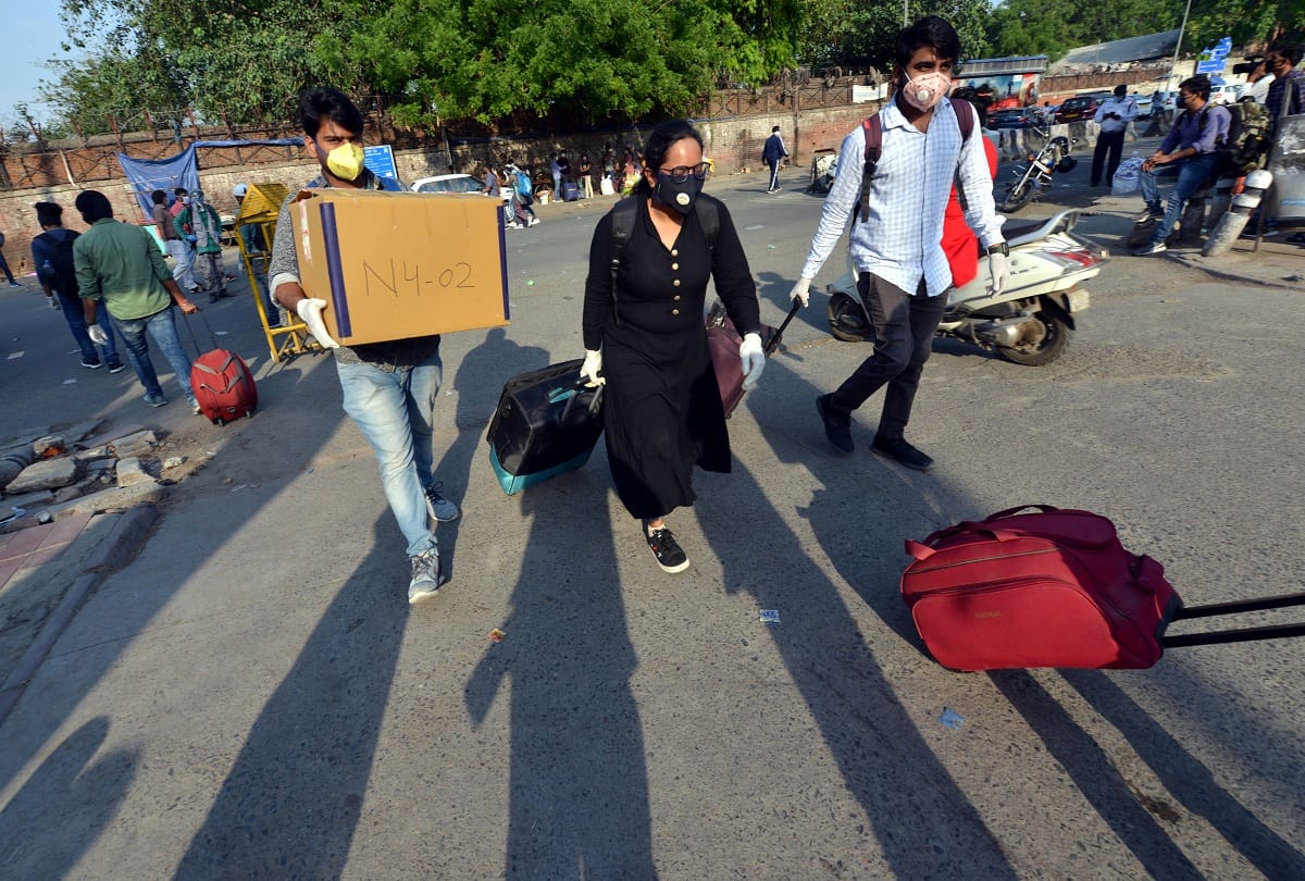 railways service resume new delhi railway station huge crowd long queue passengers