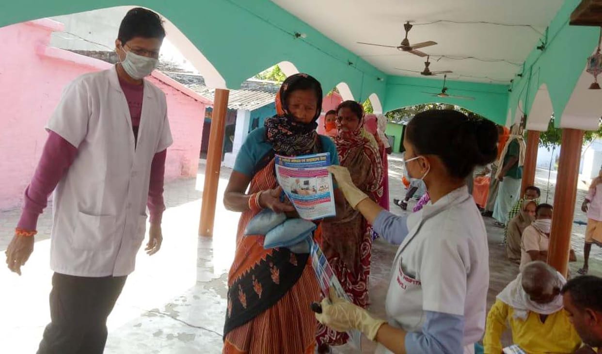 Distribution of ration materials to 35 poor families