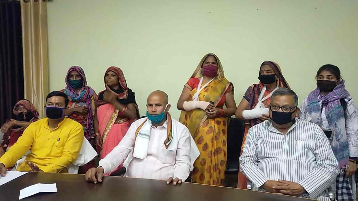 Two inspectors line up in battle with villagers