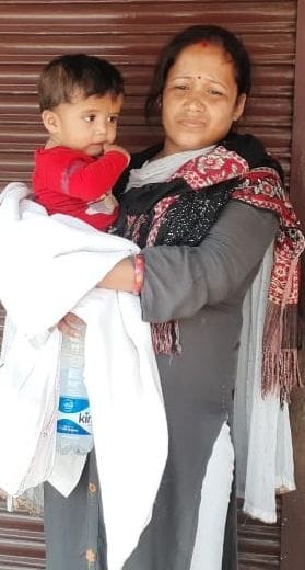 Female operator reaches duty with six months old child