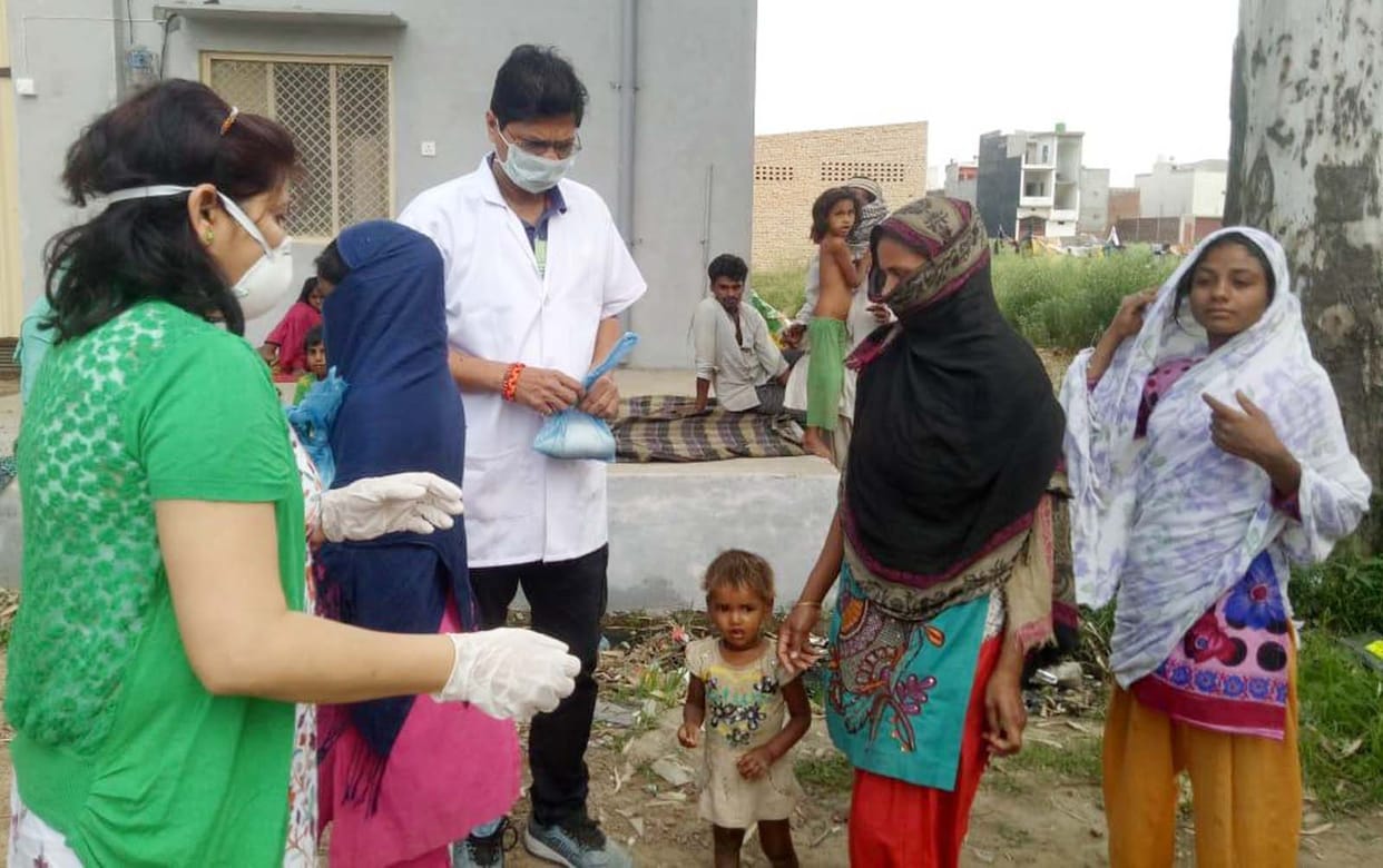 Distribution of ration kits, masks to 25 families