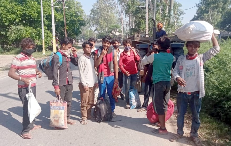 Workers going through the streets of villages to escape from the police