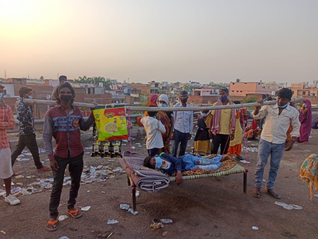 sick son on charoai, come from ludhiyana by foot
