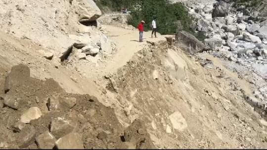 Highway blocked by debris and boulder fall