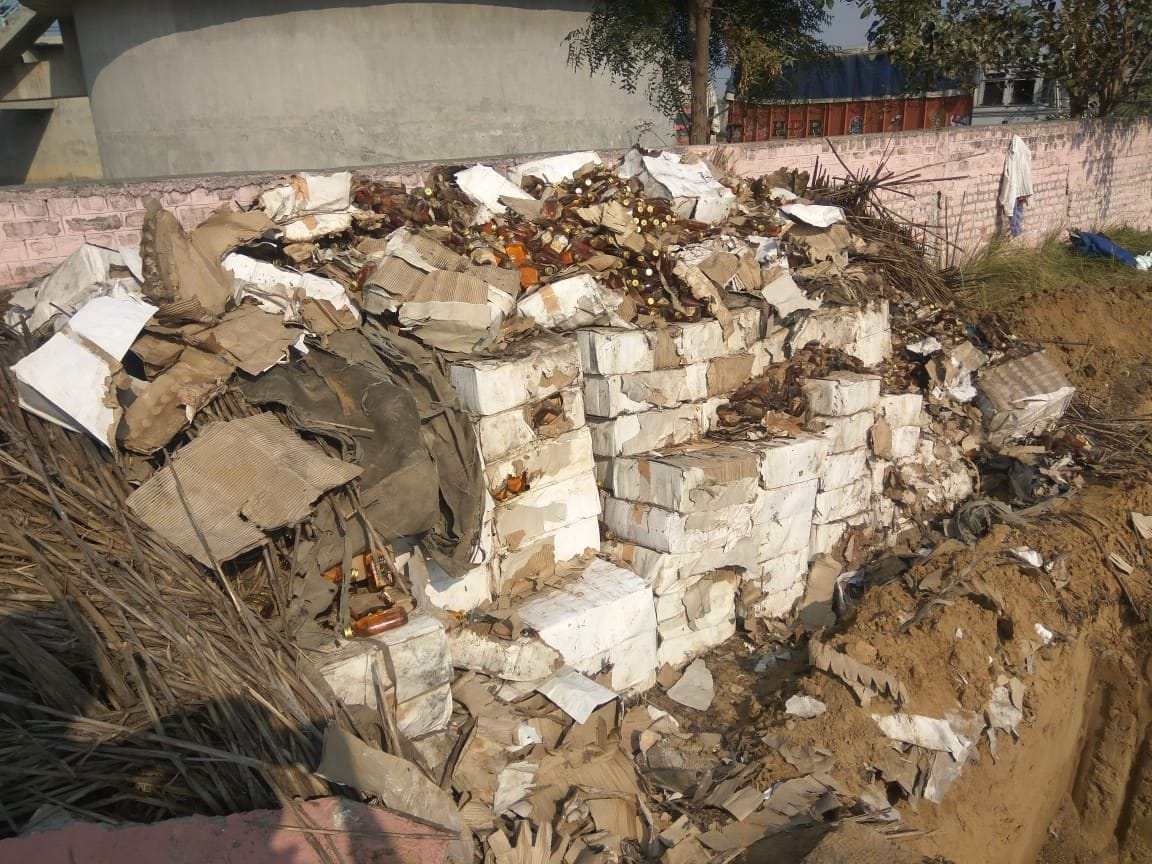 600 cases of liquor found buried in soil near Rain Base, four years ago SIT caught Zakheera