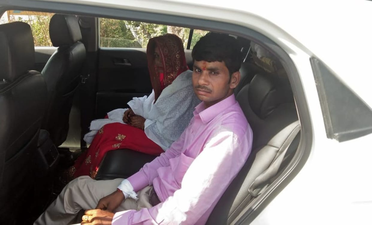 Un-stopped groom stopped while carrying the bride
