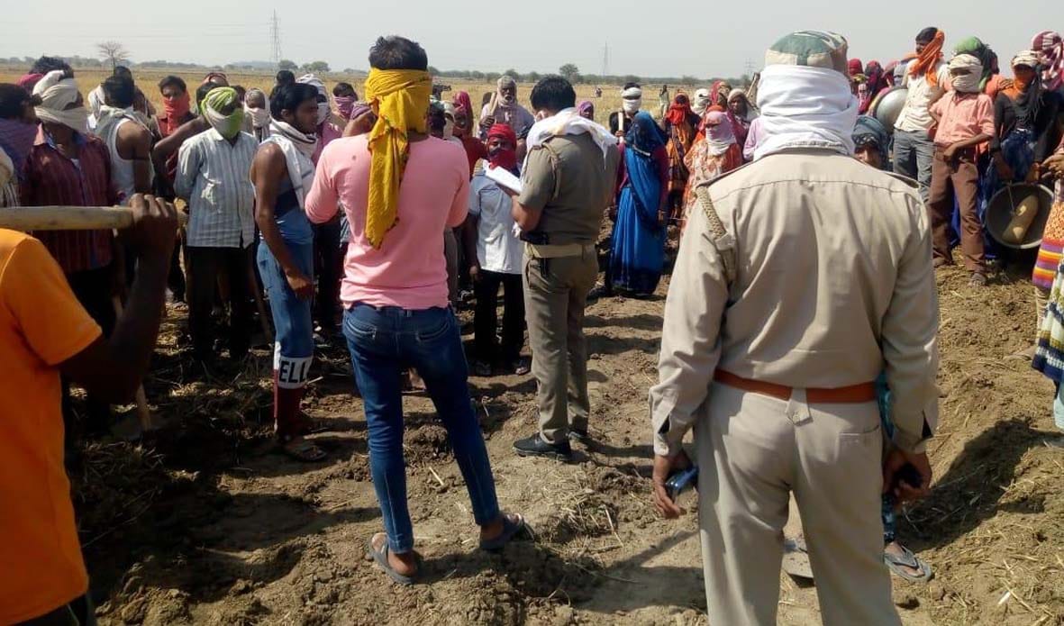 Fight between the pradhan party and the workers