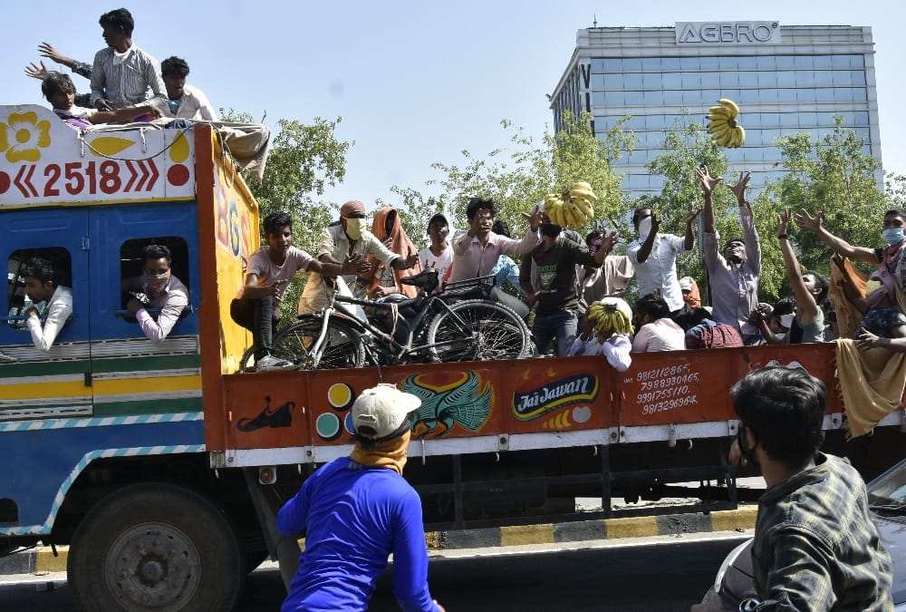 Fruits distributed to labourers in lucknow.