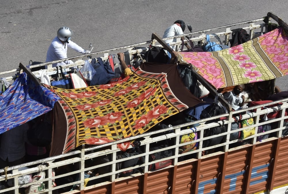 Migrant labourers are coming in trucks in huge numbers.