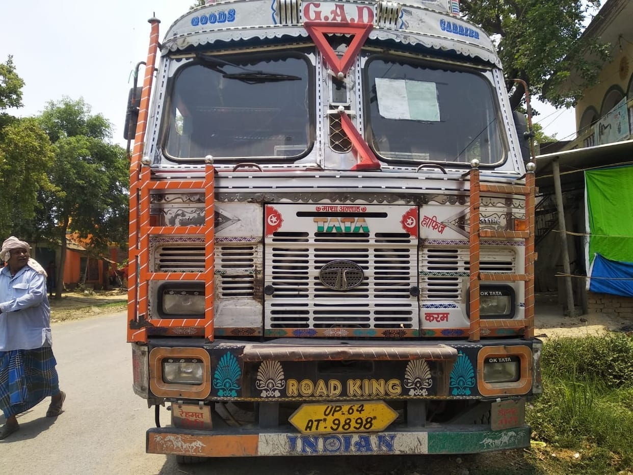 Mother dies, son injured after truck arrives