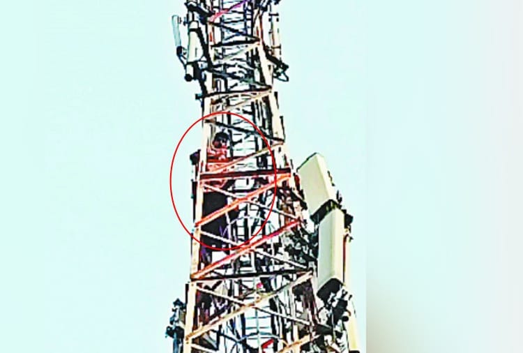 Teacher climbed on mobile tower with petrol bottle