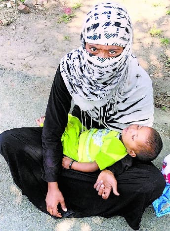 If we get begging, then the woman sits in the middle of the road with her son