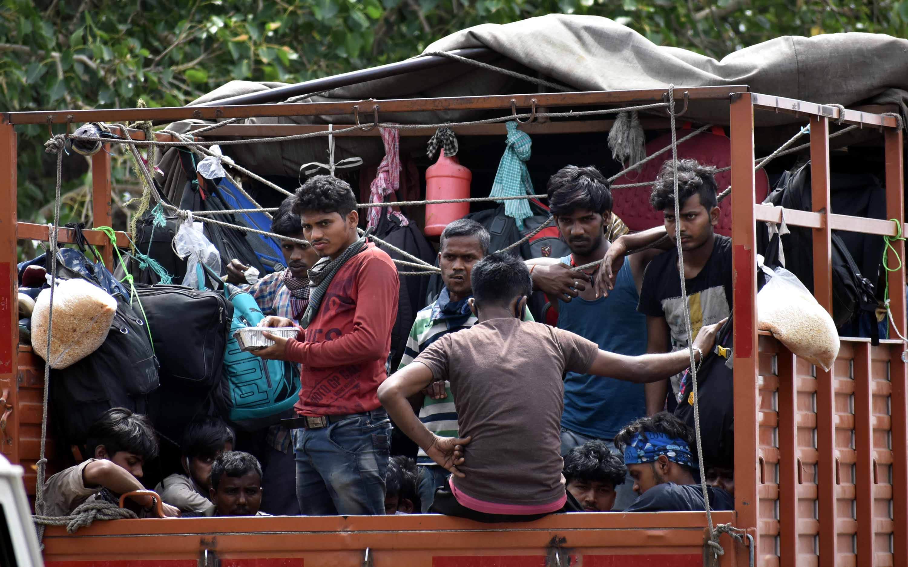 Somewhere on the bicycle and somewhere like animals, the workers who are loaded in vehicles, only the race to return home