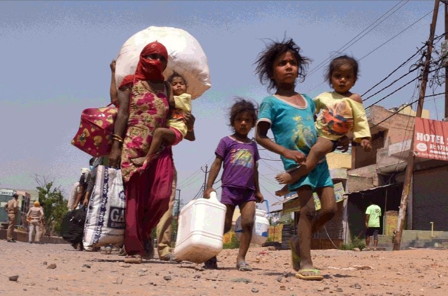Delhi ncr migrants walking going on cycle photos of their plight