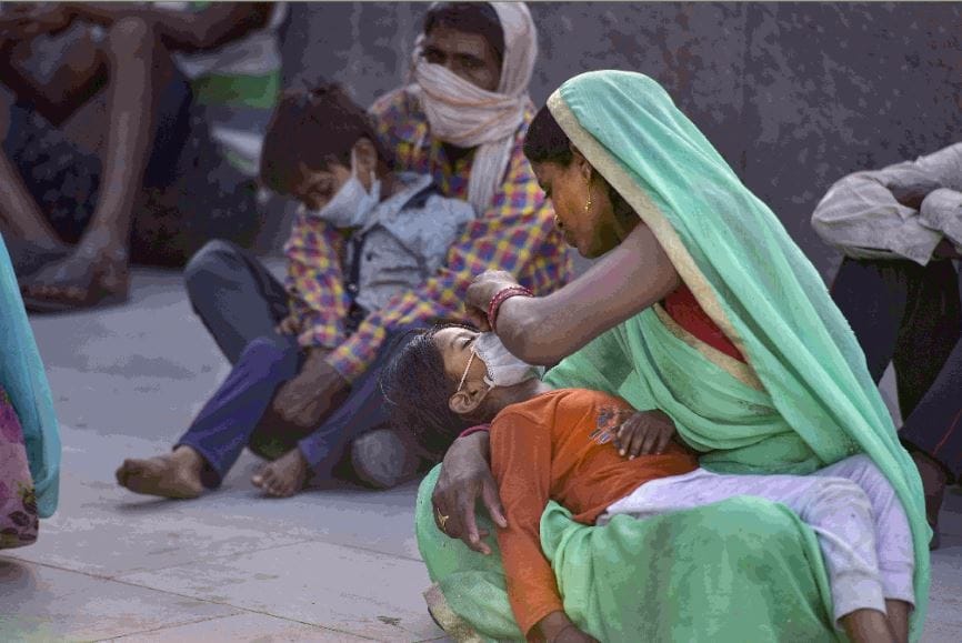 Delhi ncr migrants walking going on cycle photos of their plight