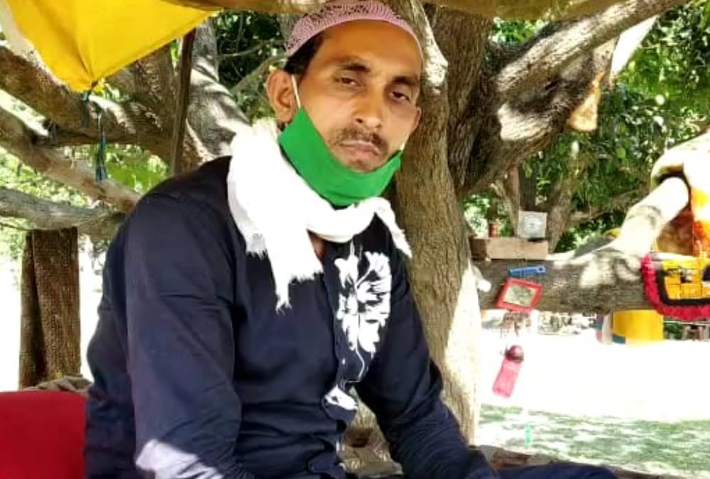 A man made himself quarantine on a tree in Ayodhya.
