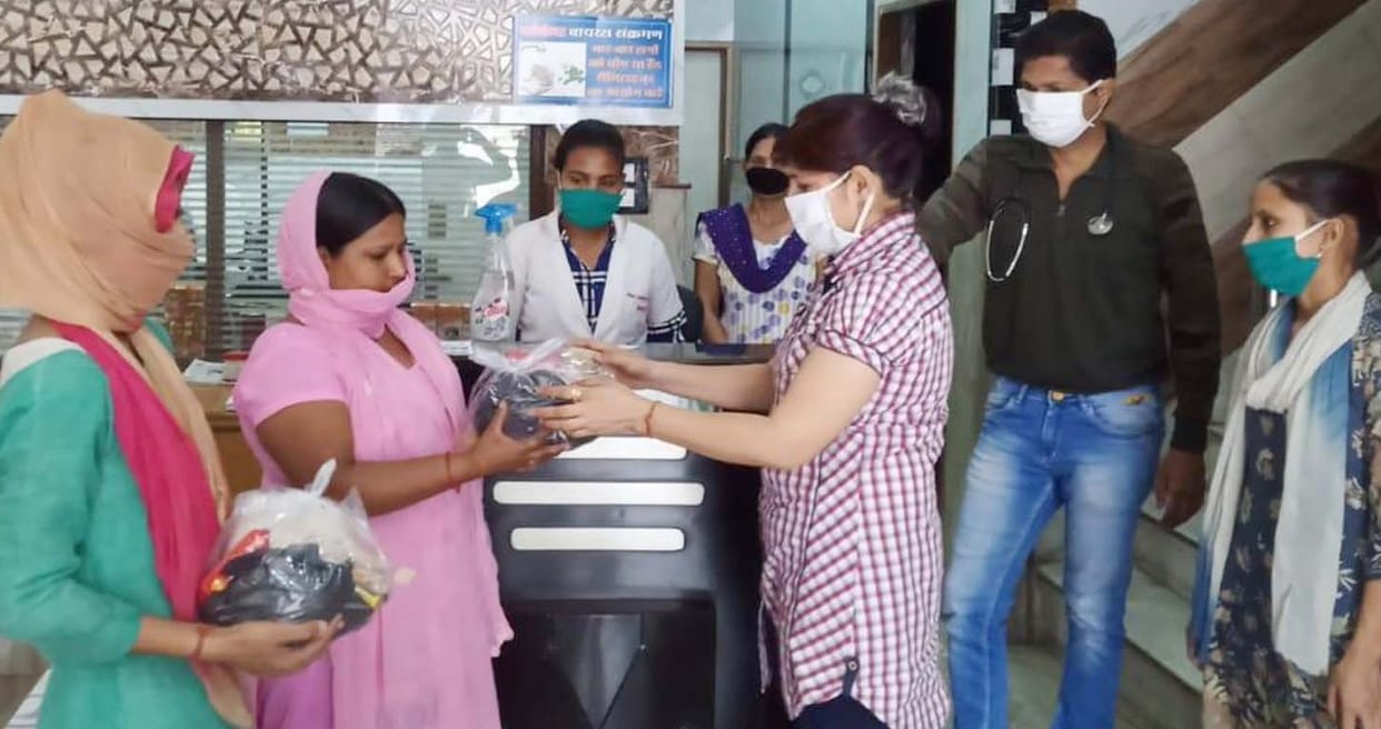 Distribution of ration materials to 23 poor families