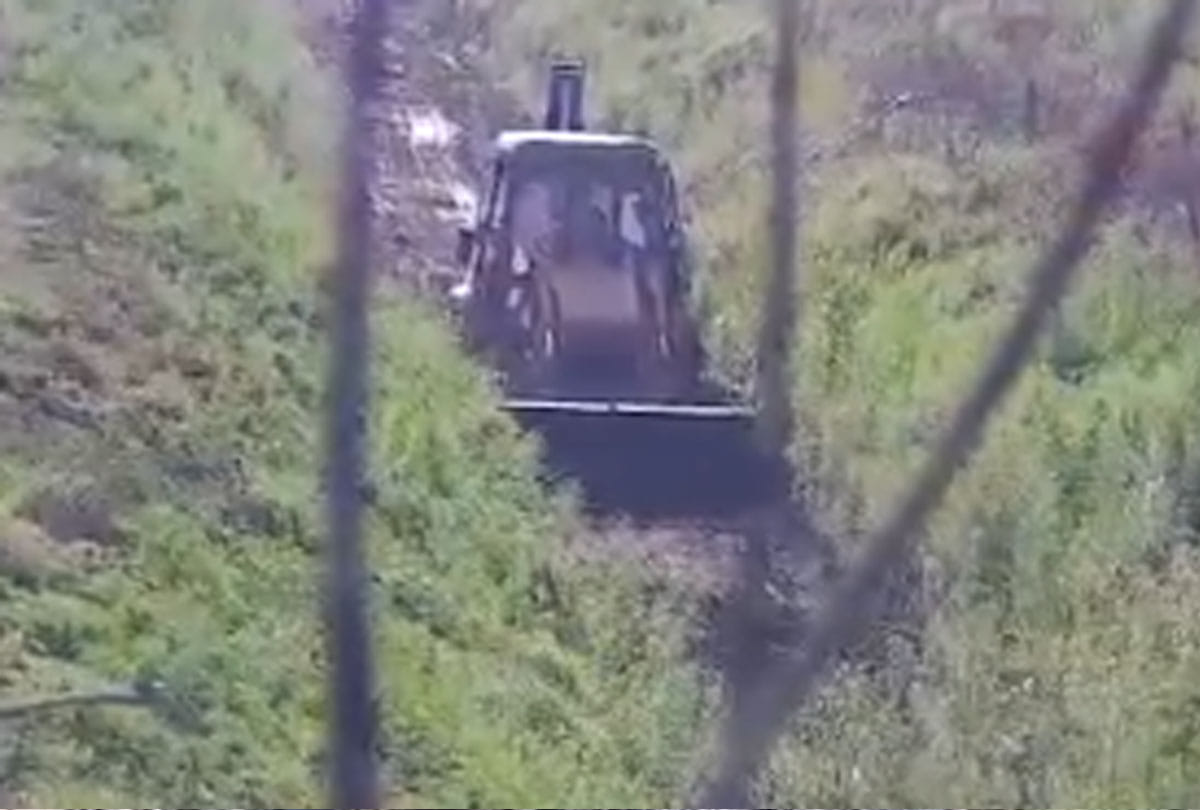 under security cover of BSF Jammu Kashmir Irrigation authorities cleaning Ranbir Canal close to border