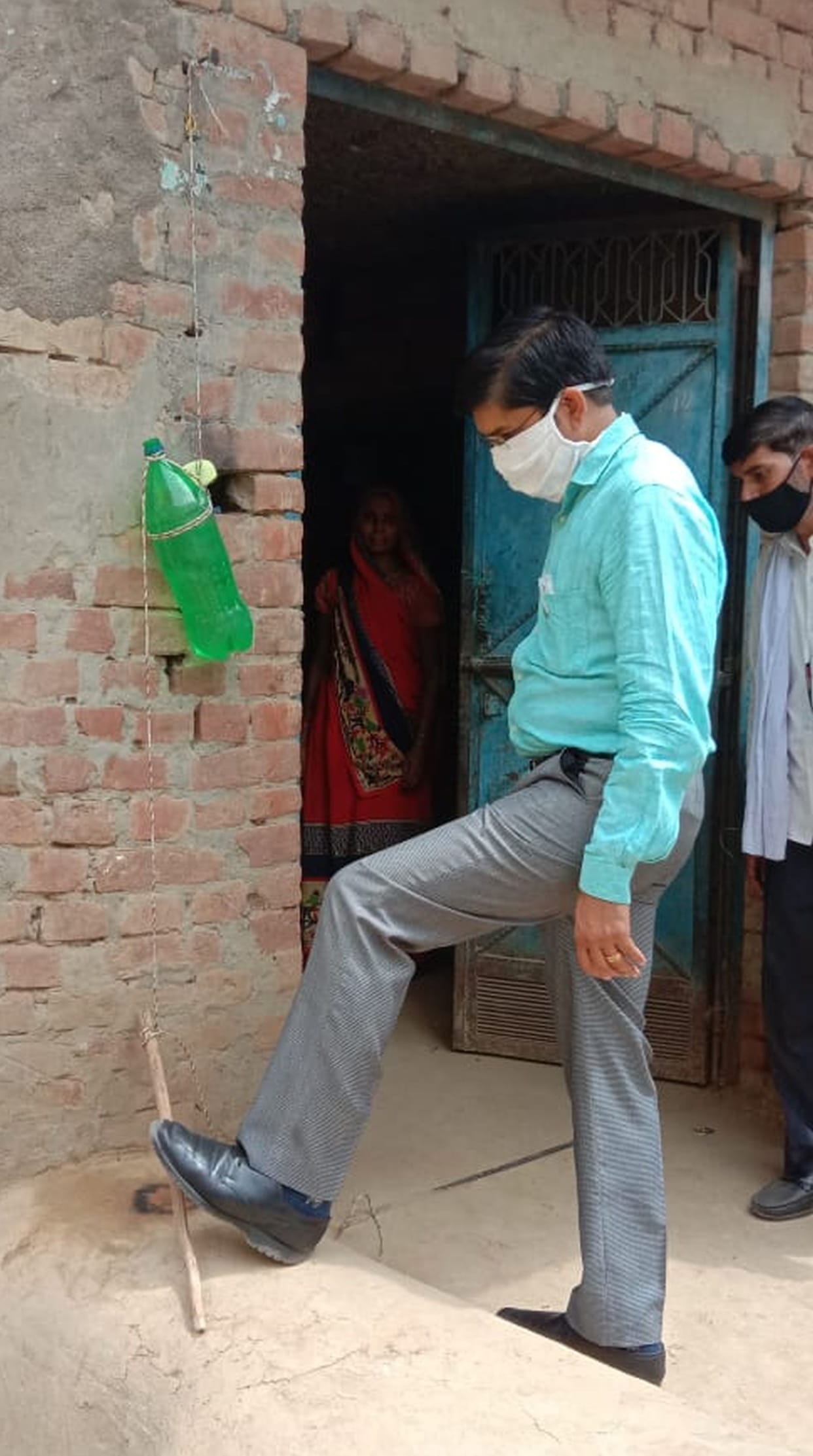 First enter the village with handwash, then mask