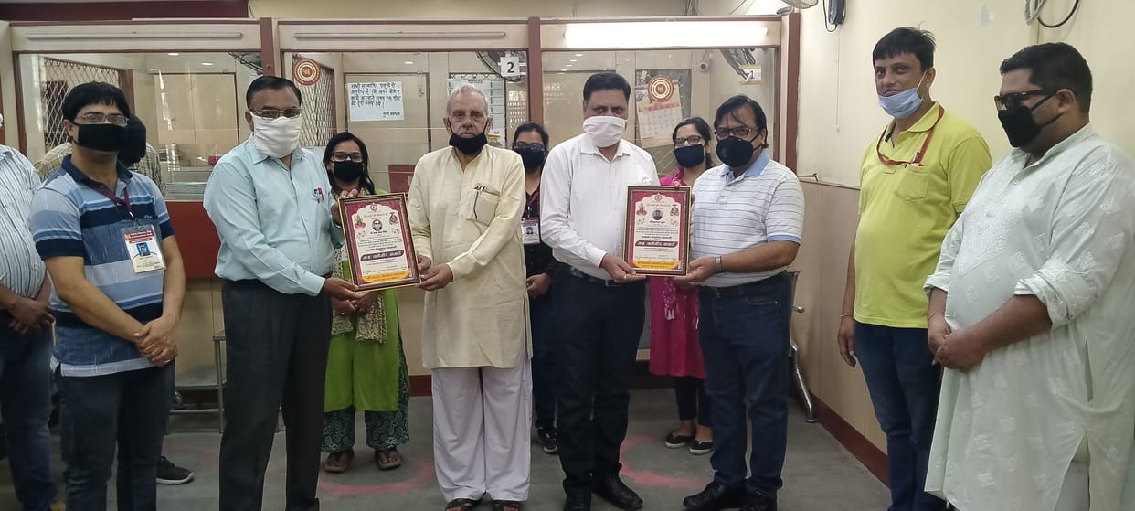 Banker awarded with Karmaveer Warrior Award